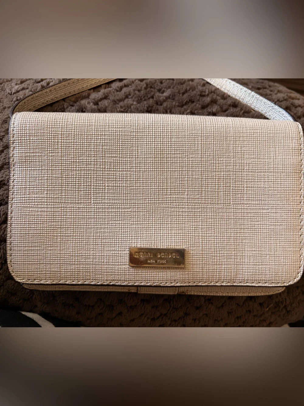 henri bendel ivory textured clutch with gold plaque